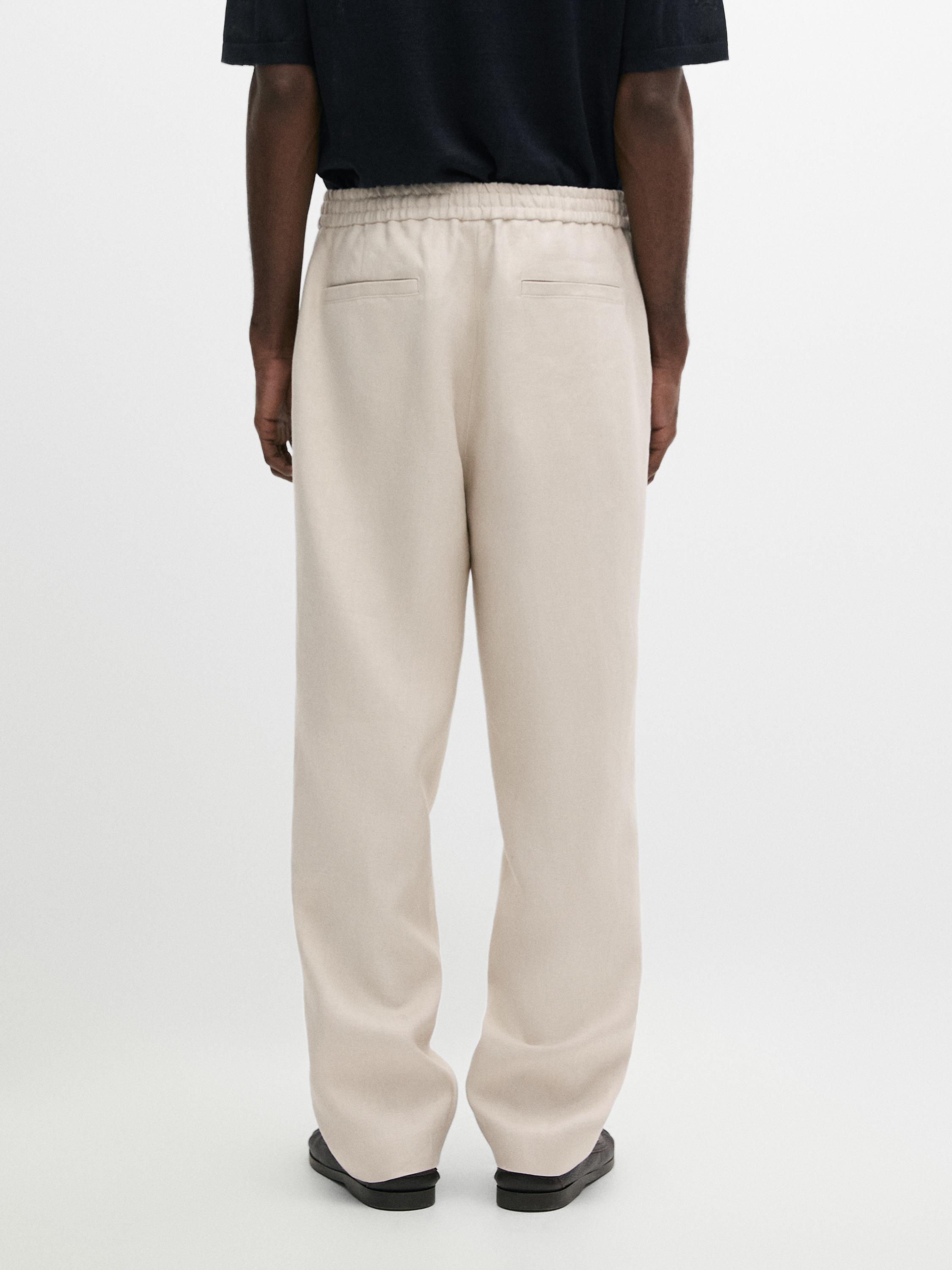 Total look linen trousers with waist detail